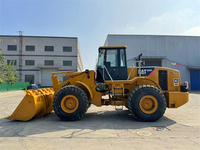 Chargeuse sur pneus Caterpillar CAT 966H d'occasion, modèle 2022, transmission 4x4, chargeuse frontale avec moteur et roulement, capacité de charge nominale de 6 tonnes