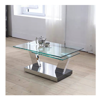 Table basse ronde de luxe avec plateau en verre trempé et base en acier inoxydable à double anneau, table de salon minimaliste et élégante