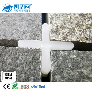 JNZ Premium Quality 100 pcs/sac Système de nivellement de carrelage au design moderne Entretoises de carrelage en <span class=keywords><strong>plastique</strong></span> pour revêtement de sol Cales de niveau mural pour mieux - Product Image 1