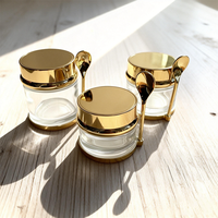 Vente en gros d'usine, pots de crème pour le visage en or rose et argent avec cuillère plate, 30g 50g 80g, ensemble d'emballage pour soins de la peau, pot en verre