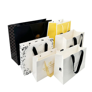 OEM tùy chỉnh paperbag bán buôn tùy chỉnh dập varnishing nghệ thuật mua sắm túi giấy - Product Image 1