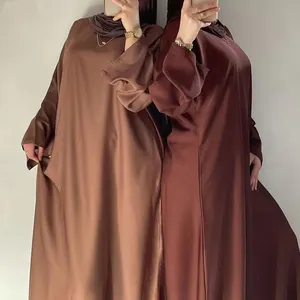 Grosir gaun Lebaran kustom Dubai mewah sutra Satin polos dengan saku lengan dalam kancing baju wanita Muslim Hijab Abaya