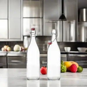 Commercio all'ingrosso 1000ml 34oz bottiglia d'acqua personalizzata trasparente succo di vetro per bevande bevande bottiglie di vetro con coperchio oscillante