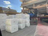 Hilo de Poliéster 100% Virgen PET de Alta Tenacidad Teñido 1.33dtex 1.56dtex 1.67dtex Semibrillante 32mm 38mm Blanco para Tejido