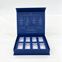 Emballage de luxe en papier rigide bleu océan, forme livre, avec fermeture magnétique, gaufrage et doublure en éponge, recyclable, pour parfum