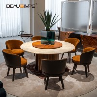 Table à manger ronde en marbre Kiru, table à manger de luxe italienne avec base en noyer et plateau tournant Lazy Susan pour salle à manger de villa haut de gamme