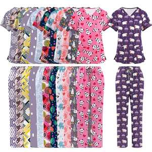 Nouveaux ensembles d'uniformes médicaux pour femmes imprimés de dessins animés avec pantalon droit – Tenues confortables pour infirmières et médecins - Product Image 1
