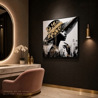 Tableau mural sur toile de luxe avec portrait de femme africaine en or noir et feuilles d'or, idéal pour la décoration de salon
