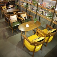 Ensemble table et chaises de restaurant en bois massif moderne pour cafés, salons de thé, pâtisseries, magasins de vêtements, et chaises de réception/négociation