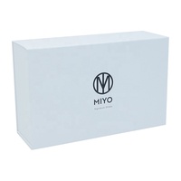 Boîte cadeau pliable magnétique en papier de luxe personnalisée avec doublure en éponge et gaufrage pour l'emballage de vêtements, de chaussures et de chaussettes