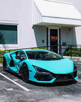 Kit carrosserie en fibre de carbone sèche pour Lamborghini Revuelto, comprenant : lèvre avant, jupes latérales, diffuseur, spoiler et cache-moteur (compatible OEM Revuelto)