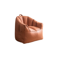 Fauteuil canapé enfant monoplace compressible, multicolore, adapté à plusieurs espaces tels que les salons et les bureaux.