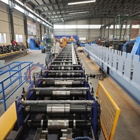 Machine de formage à froid de profilés de rails en acier à grande vitesse et personnalisée pour la production intensive en entrepôt