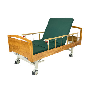 Cama de enfermería manual de madera para el cuidado de ancianos, uso en el hogar y hospital, con respaldo ajustable y barandillas laterales. - Product Image 1