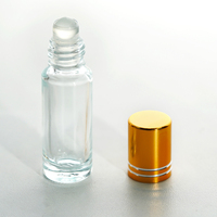 Vente en gros Bouteille de rouleau de parfum vide d'huile essentielle de parfum de 25ml Bouteille en verre de parfum avec boule roulante avec couvercle doré