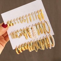 Nouvel ensemble de boucles d'oreilles créoles tendance en alliage, perles et papillons en acrylique pour femmes, bijoux creux en alliage de zinc