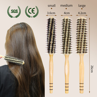 Brosse ronde professionnelle en bois à poils de sanglier haute densité pour sécher, lisser et coiffer les cheveux bouclés