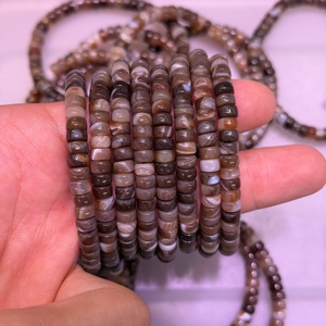 Bracciale Elastico con Perline Heishi in Cristallo Naturale del Botswana, Gioielli Unisex Impilabili con Immagine di Cristallo e Feng Shui - Product Image 1