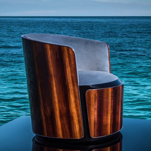<span class=keywords><strong>Sillón</strong></span> Lounge de Cuero Acolchado Liso con Chapa Curva Envolvente, Elegante, Minimalista <span class=keywords><strong>y</strong></span> Aerodinámico para Penthouse o Dormitorio - Product Image 1