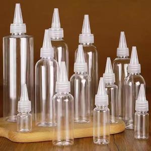 Bouteille d'emballage vide d'applicateur d'huile de cheveux en plastique transparent de 10ml 15ml 30ml avec le chapeau de distribution ouvert par torsion - Product Image 1
