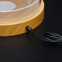 Présentoir de bouteilles de vin en acrylique à éclairage LED