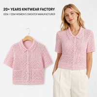 Cardigan en tricot crocheté rose pour femme, personnalisé OEM ODM, à manches courtes, boutonné, ajouré, avec poches plaquées