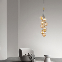 Lustre de luxe moderne en verre ambré à plusieurs têtes, en forme de globe, pour escalier en colimaçon, lampe suspendue longue verticale pour hall duplex, plafond haut, foyer
