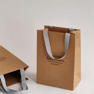 अनुकूलित पर्यावरण के अनुकूल उपहार पैकिंग के साथ Biodegradable ब्राउन क्राफ्ट पेपर बैग संभाल