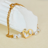 Bracelet élégant pour femme en acier inoxydable, design minimaliste étoile avec nacre et perle battement de cœur, idéal pour le quotidien