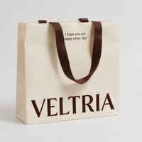 Sacs pour produits cosmétiques, sacs en papier d'emballage de luxe avec votre propre logo, tendance pour la vente au détail, sacs en papier cadeau avec poignée