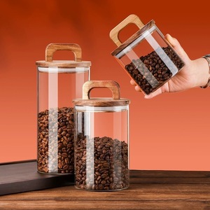Tarro de vidrio de almacenamiento de cocina con tapa de madera de acacia Juego de tarros de vidrio de almacenamiento personalizado para especias y alimentos - Product Image 1