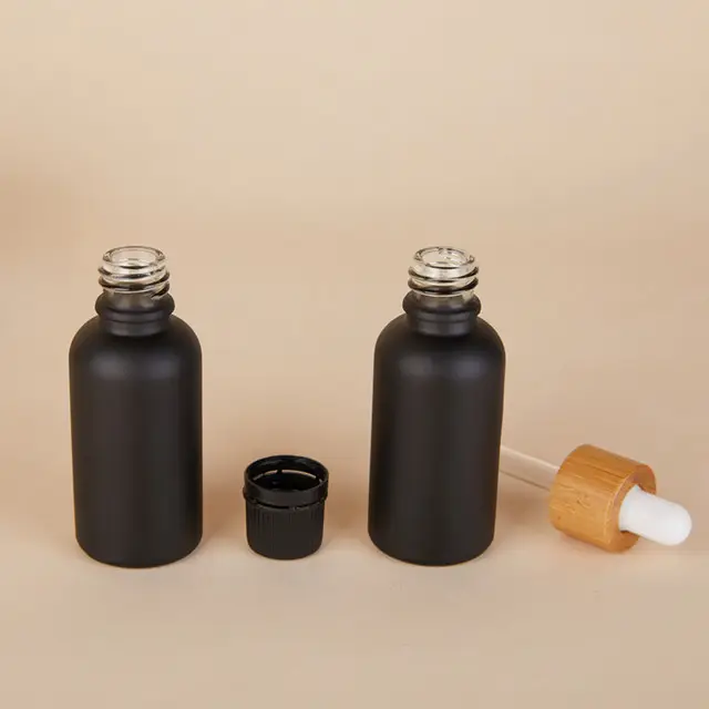 बांस ड्रॉपर के साथ थोक दाढ़ी तेल की बोतल मैट ब्लैक यूरो आवश्यक तेल ग्लास ड्रॉपर बोतल
