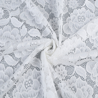 Tissu en dentelle élastique en spandex, motif ajouré, doux, confortable, tricoté, léger, matière 90N10SP, pour vêtements féminins et confection sur mesure à domicile