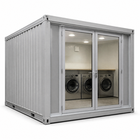 Unité de buanderie modulaire en conteneur avec portes vitrées doubles et panneaux nervurés pour services de blanchisserie commerciaux et hôteliers