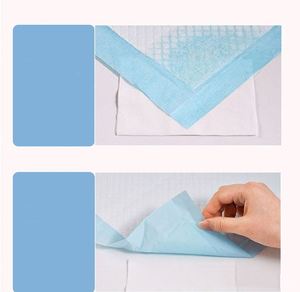 แผ่นรองซับฉี่สุนัขแบบมีกาวในตัว ขนาด 22" x 22" และ 28" x 30" สีขาวผสมถ่าน สำหรับฝึกขับถ่ายสุนัขและลูกสุนัข ตัวอย่างฟรี - Product Image 4