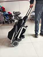 Poussette parapluie quatre roues de haute qualité et économique, ultra-légère, pour bébés de 3 mois et plus, avec positions assise et allongée, l'accessoire de marche indispensable.