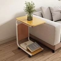 Mesa de centro lateral moderna simple del lado de la sala de estar multiusos para el diseño interior con la rueda