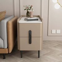 Lemari samping tempat tidur mewah yang sederhana untuk kamar tidur rumah modern dan bergaya. Lemari penyimpanan kecil yang fungsional dan canggih untuk samping tempat tidur.