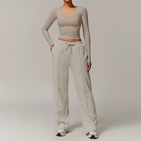 Vêtements de sport pour femmes très vendus en automne et en hiver, hauts de yoga à manches courtes et longues, pantalons de sport et ensembles de yoga avec poches pour femmes