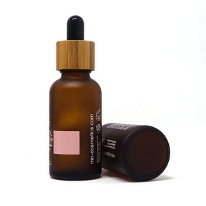 Venta al por Mayor de Botellas de Vidrio Natural de 15 ml, 1 oz, 30 ml, 100 ml, Color Azul, Verde, Ámbar, Negro, Transparente, Esmerilado, con Gotero y Tapa de Bambú - Product Image 5