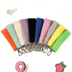 Parches Termoadhesivos Personalizados de Corea de 32mm de Ancho en Colores Surtidos con Correa para Nombre y Llavero con Ganchos Plateados - Product Image 1