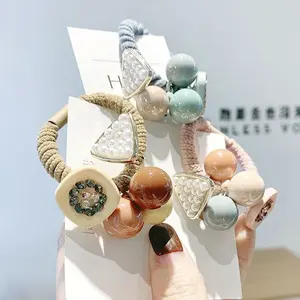 Neues 2024 Designer koreanisches süßes Mädchen Frühjahr Sommer Perlenball spiralförmiges elastisches Seilband Haarschlips Gummihaar Kristall