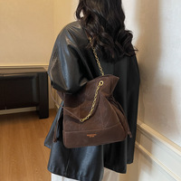 Sacs seau rétro transfrontaliers à chaîne pour femmes, nouvelle collection hiver 2025, sac à bandoulière décontracté simple avec cordon de serrage