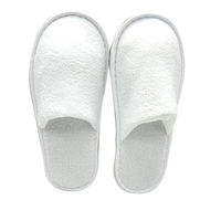 Chaussons en molleton de corail de luxe Chaussons d'intérieur jetables antidérapants Chaussons blancs pour chambre d'hôtel en gros