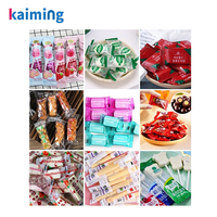 Machine d'emballage de bonbons en forme de coussin, pour chocolats, biscuits, pilules et accessoires, avec alimentation automatique