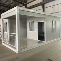 Maison conteneur préfabriquée modulaire en acier de 20 pieds avec mur rideau en verre pour bureau, studio, jardin, extérieur