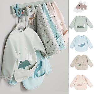Delantal de bebé de alimentación ajustable de bajo precio, babero impermeable para bebé, bata de manga larga con bolsillo para niños y niñas - Product Image 1