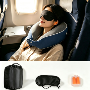 Oreiller de voyage ergonomique en mousse à mémoire de forme pour la protection cervicale, avec sac de rangement, masque pour les yeux et bouchons d'oreilles - Product Image 1