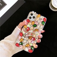 Nouvelle coque de téléphone de luxe en forme de cœur, de marque de créateur, avec strass scintillants et diamants, pour iPhone 17 16 15 14 13 11 12, étui parfum pour filles