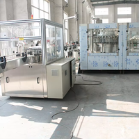 Machine d'étiquetage à colle thermofusible linéaire OPP pour bouteilles rondes